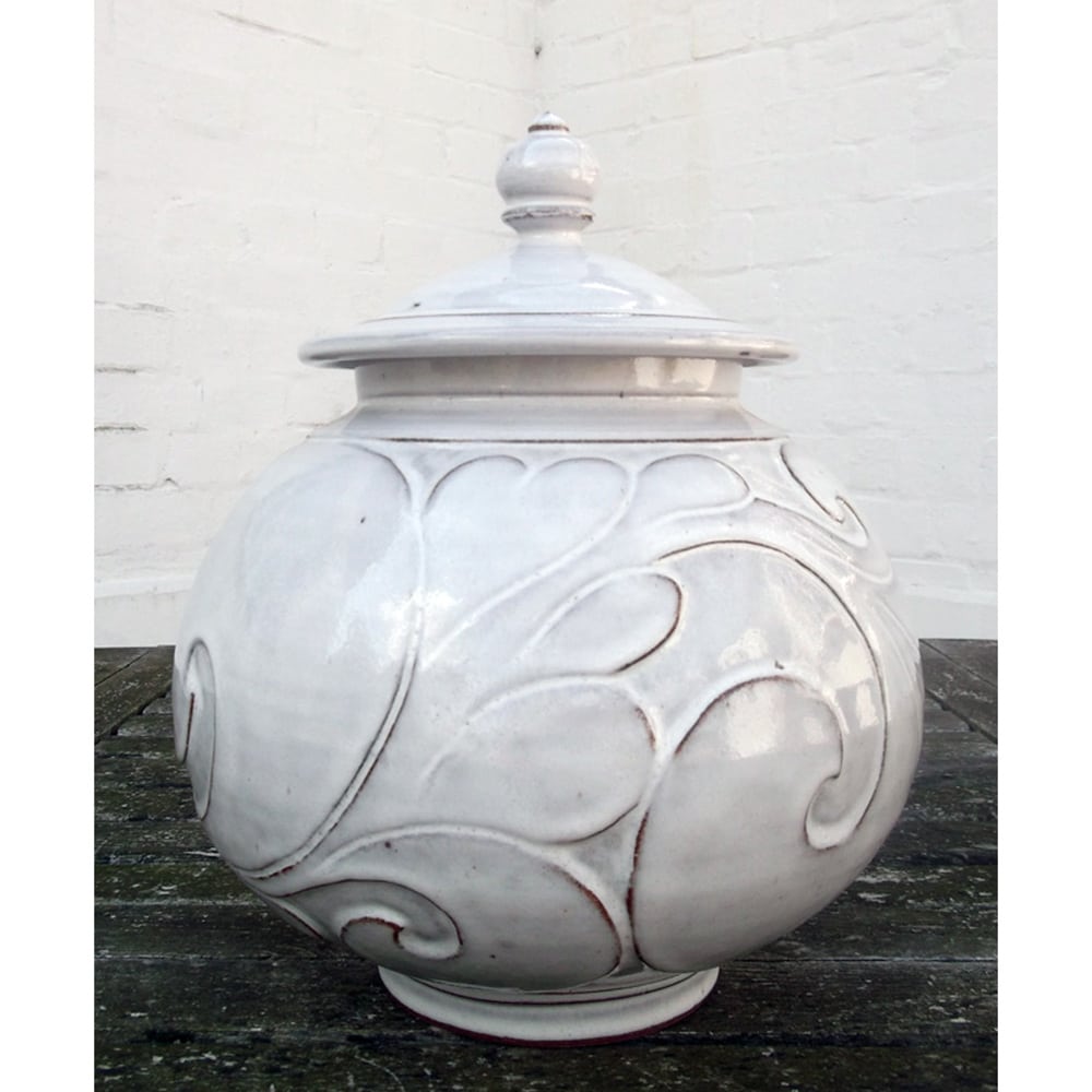 lidded white pot
