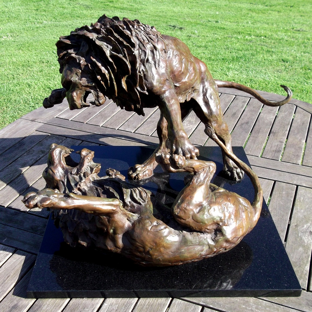 bronze sculpture of lions