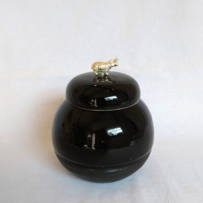 black lidded pot