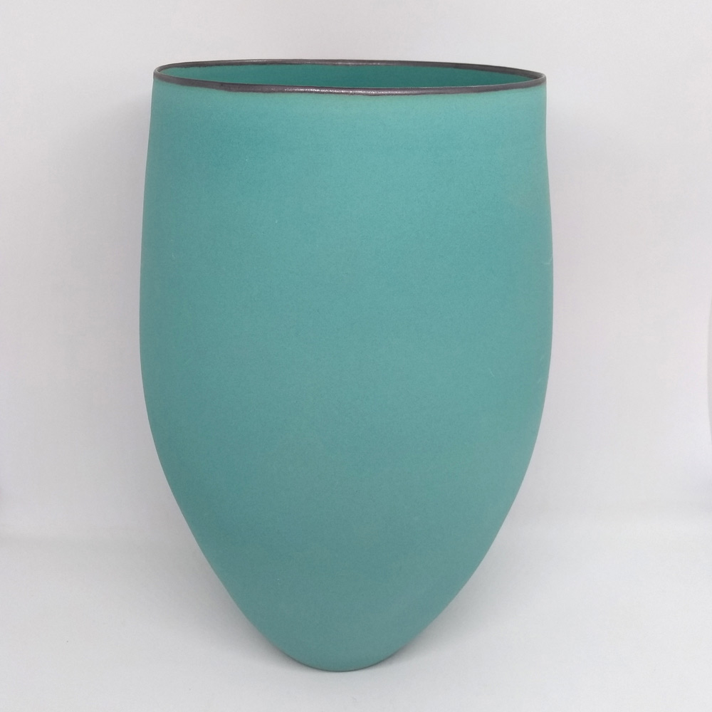 tall turquoise vessel